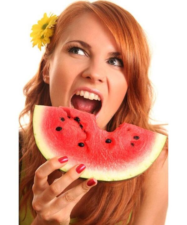 Girl eats watermelon on watermelon diet